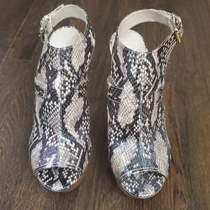 **Never Worn** Animal print peep toe heels